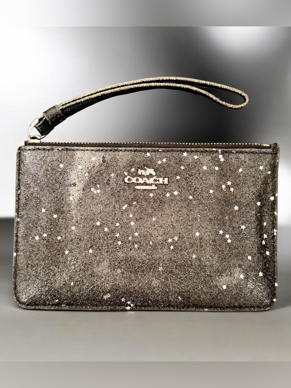 COACH Metallic Black Pewter Star Wristlet